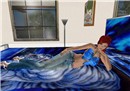 SakuraLayingonbed