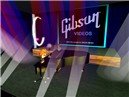 Cylindrian sings her songs with playing piano