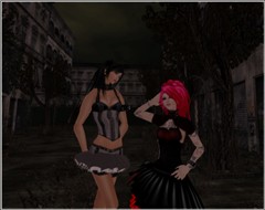 Two Beauty Girls in a Dirty Street
