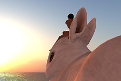 Sitting on the head of the bunny... - Raul Crimson