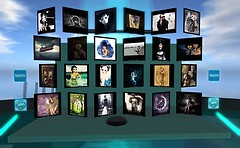 rotating wall showing art from different virtual worlds - Torley Olmstead