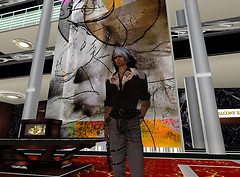 Chrome standing in front of digital mural, Orbit