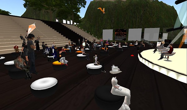 The auditorium is crowded. The Orange Island closing event sounds
 promising. - Natty Foggarty