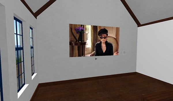 watching Yoko Ono's videos in Second Life - Koinup Burt