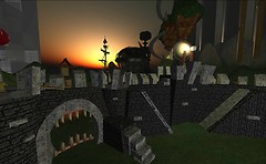 sunrise over castle ramparts - Torley Olmstead