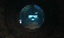 an underwater tunnel leads to the blue glow light - Torley Linden