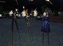 3 Stilt-wearing Fire Jugglers - chimera.cosmos